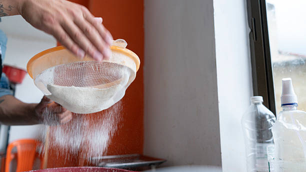 Powdered sugar in a metal sieve