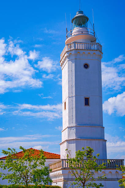 istock Lighthouse at the marina in Rimini, Emilia-Romagna, Italy, standing as a timeless beacon over the coastal waters and blending maritime history with scenic seaside charm 2212615001