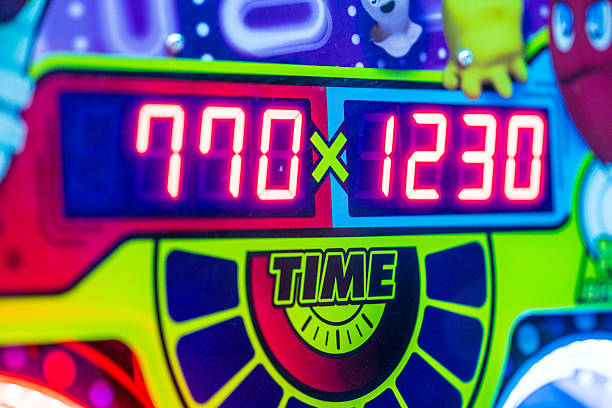 Digital game scoreboard with glowing red numbers.