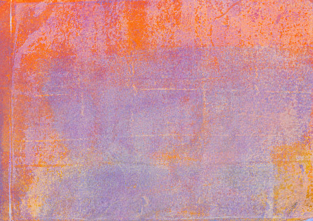 Grungy textured background hand painted with shades of purple and orange acrylic paint on paper.