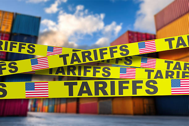 istock USA tariff tape barricading cargo freight in shipping yard 2212633536