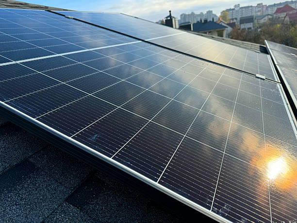 istock Sunlit rooftop with solar panels generating clean energy 2212633818