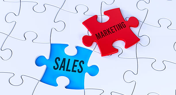 istock Sales Marketing Integration Connection Puzzle Pieces Concept Paper Cut Blue Red 2212634991
