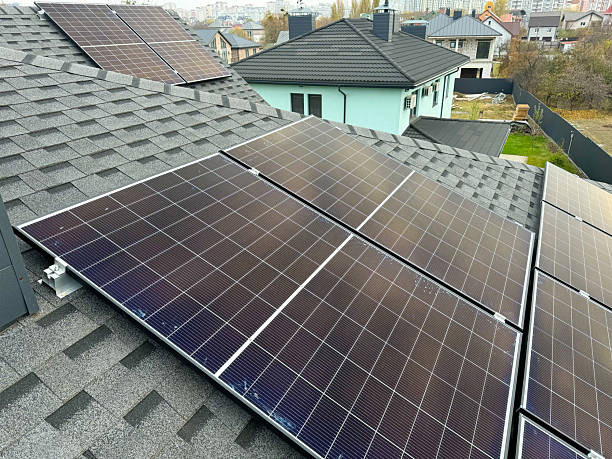 istock Solar energy solution for homes, panels installed on a roof. 2212635144