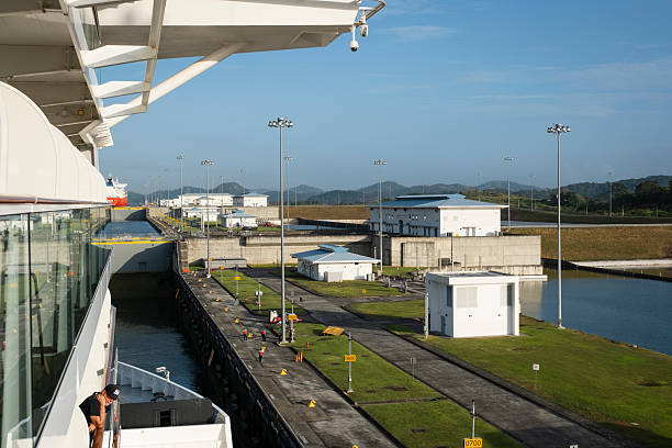 Panama City, Panama - February 17, 2025: A large cruise ship entering the first lock of the Panama Canal on the Pacific Ocean side.