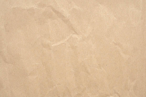 istock Abstract crumpled and creased recycle brown paper texture background 2212649709