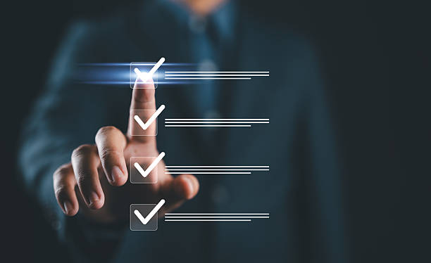 istock Quality check, Businessman makes a checklist Assessment and questionnaire, businessman using smartphone to do online survey, online digital form check mark Choose the correct answer on the exam. 2212658511