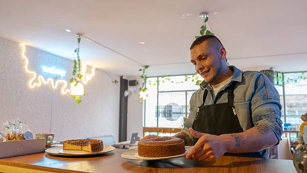 istock young men in coffee  shop. 2212658530