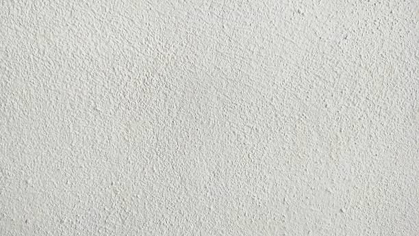 istock White wall on the background. The​ pattern​ of​ surface​ wall​ concrete​ for​ background. Abstract​ of​ surface​ wall​ concrete​ for​ vintage​ background. 2212659909