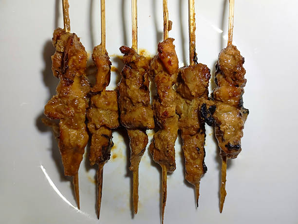 istock Delicious Grilled Skewered Meat Satay. 2212663782