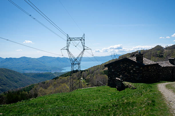 istock Mountain view with power lines, cabin 2212669411