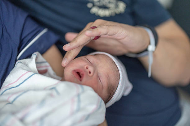 istock Family with Newborn 2212669826