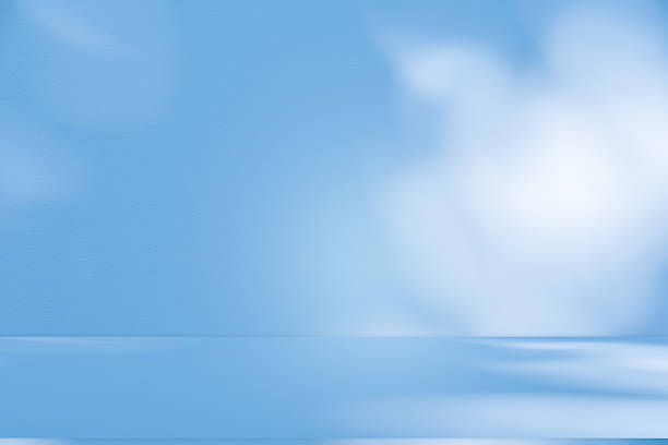 istock Studio style background wall decoration presentation uses white and blue tones. with shadows cast from a nearby window, concept creating a decorative 2212671302