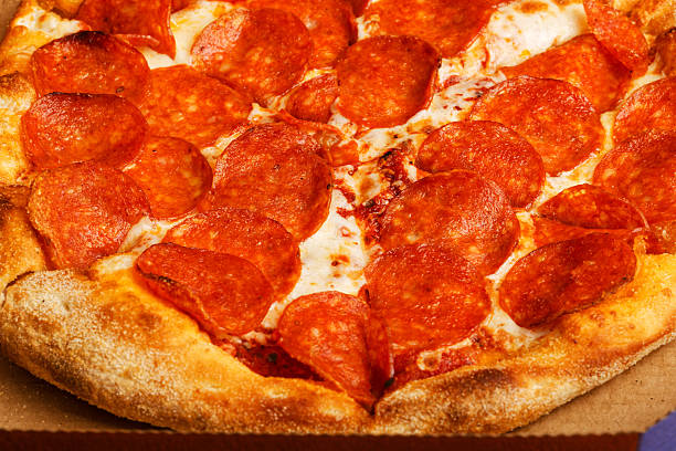istock Closeup view pizza with pepperoni 2212672615