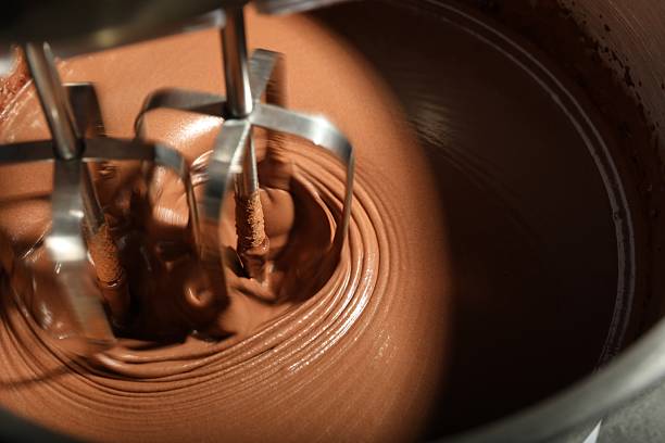 Top view of lots of milk chocolate pieces