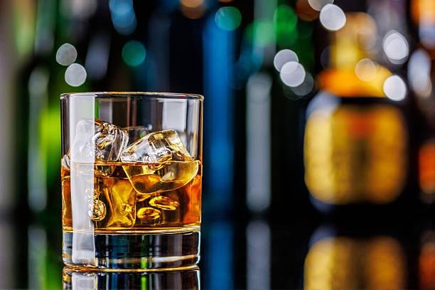 istock Whiskey on the rocks on a bar table 2212688265