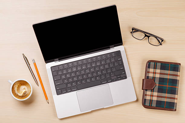 istock A clean and minimal desk setup featuring a laptop and a coffee cup 2212688569