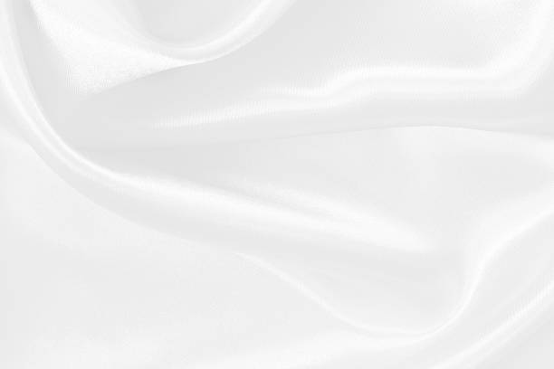 istock White fabric texture background, detail of silk or linen pattern. 2212690756