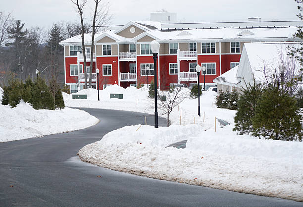 modern apartment building after winter snow storm