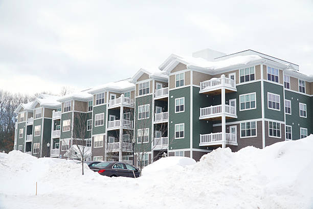 modern apartment building after winter snow storm