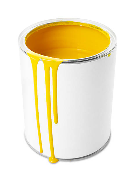 istock Can with yellow paint isolated on white 2212691975