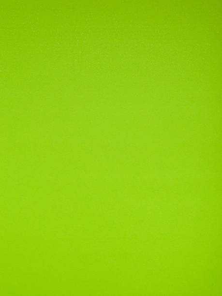 istock A textured surface of lime green paper. 2212693063