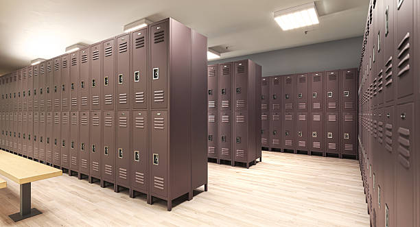 istock Empty school lockers in a changing room with wooden floor 2212699637