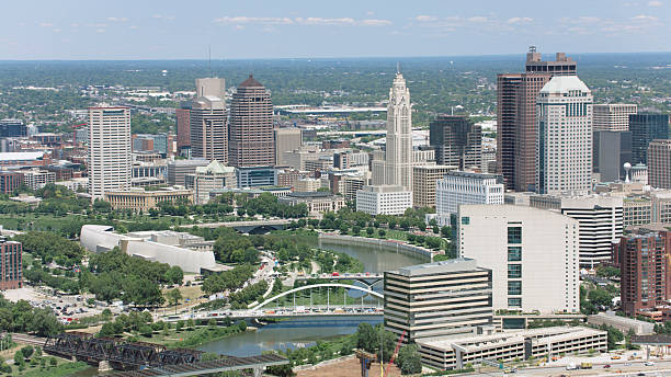 istock Downtown Columbus Georgia Skyline with Modern Architecture and Lush Greenery on a Sunny Day 2212710665