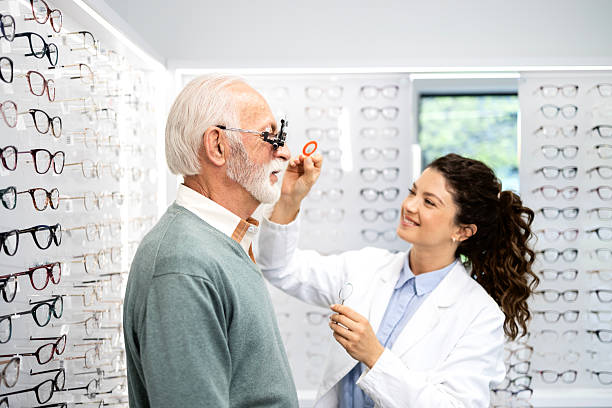 istock Senior man checking eyesight and diopter. 2212723287