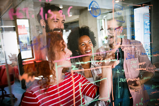 istock Team of programmers writing digital code in the metaverse and working together on the internet 2212726683