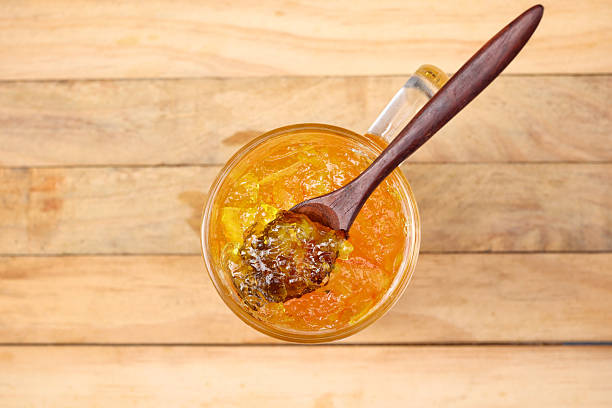 istock Orange marmalade jam on jar 2212727216