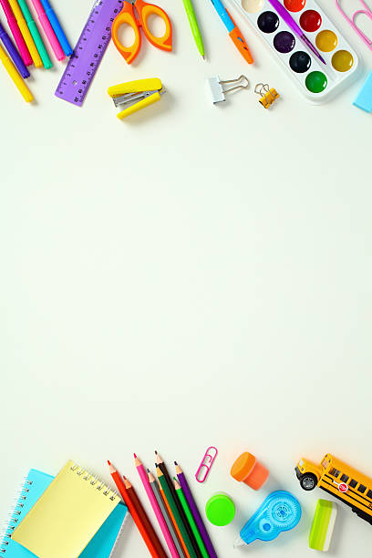 istock Back to school concept. Colorful stationery frame on white background with copy space 2212733554