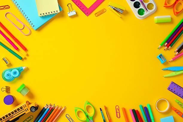 istock Back to school supplies frame on yellow background with copy space. 2212734050