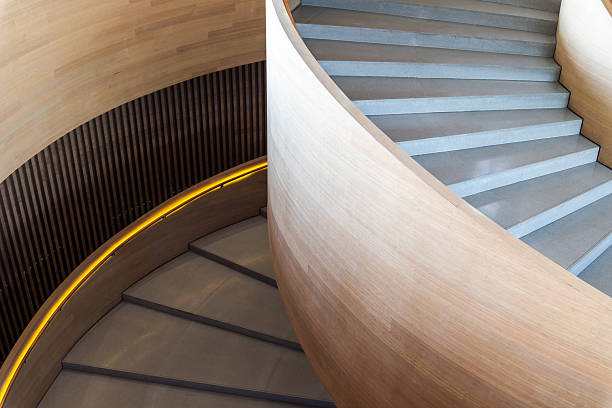 istock Curved Modern Wooden Spiral Staircase 2212749806