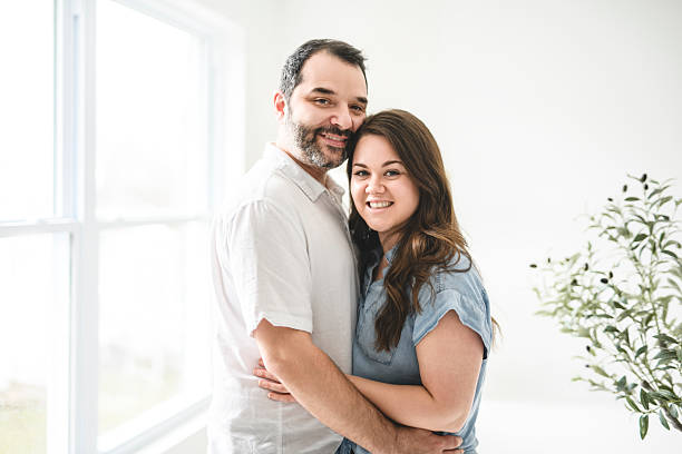 istock nice and Natural couple portrait at home 2212751676