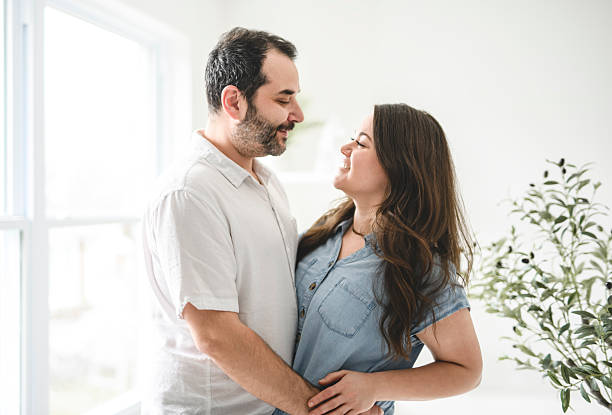 istock nice and Natural couple portrait at home 2212751678