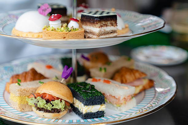 istock Elegant Afternoon Tea Set with Savory and Sweet Pastries 2212753038