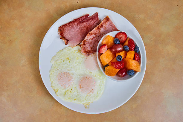 Cozy American Breakfast with Fresh Fruit and Ham, Angled Top View