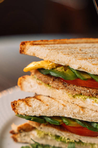 istock Grilled Meat and Tomato Triangle Sandwiches 2212757676