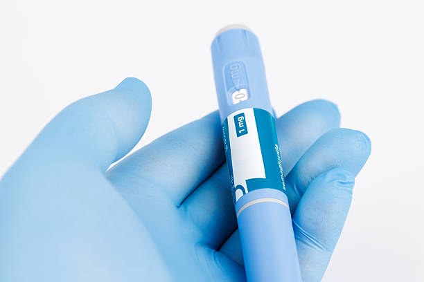 istock White background layout with GLP-1 receptor agonist pens for therapy 2212761681