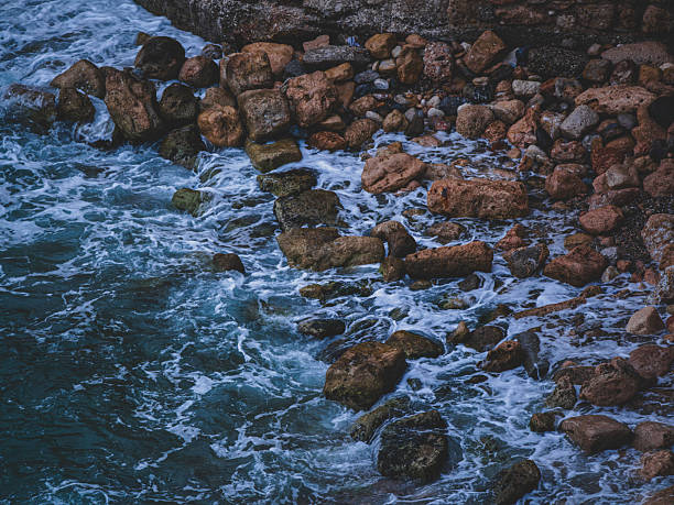 beautiful waves crashing on rocks
