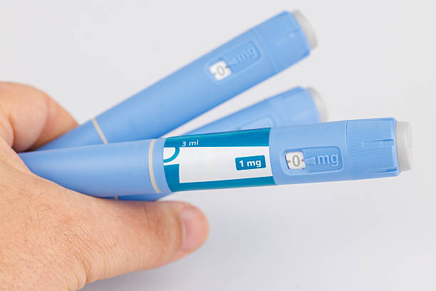 istock Isolated horizontal image of GLP-1 Semaglutide therapy injection pens 2212761846
