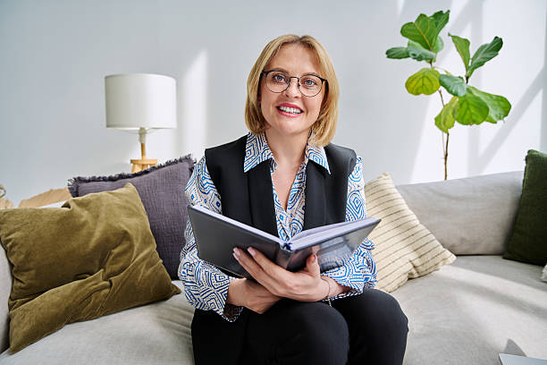 istock Webcam view middle aged businesswoman looking talking in camera 2212764032