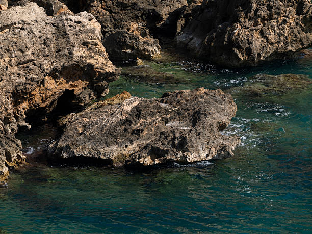 beautiful waves crashing on rocks