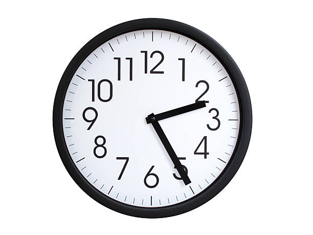 Simple round wall clock with black frame and white face, showing the time exactly at 02:25 or 14:25. Representing time precision in concepts of deadlines.