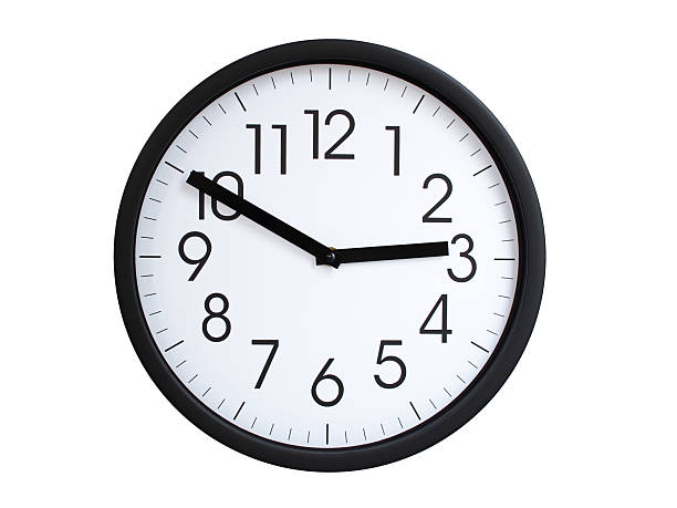 Simple round wall clock with black frame and white face, showing the time exactly at 02:50 or 14:50. Representing time precision in concepts of deadlines.