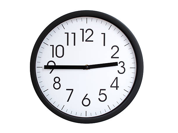 Simple round wall clock with black frame and white face, showing the time exactly at 02:45 or 14:45. Representing time precision in concepts of deadlines.