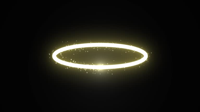Yellow glowing circle with shimmering particles on a dark background. Halo animation. Use blend modes to make the background transparent.