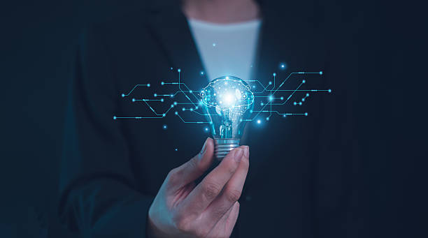 istock Hand of  holding illuminated light bulb, Idea innovation and inspiration concept.  creativity with bulbs that shine glitter, Concept for success. 2212770180