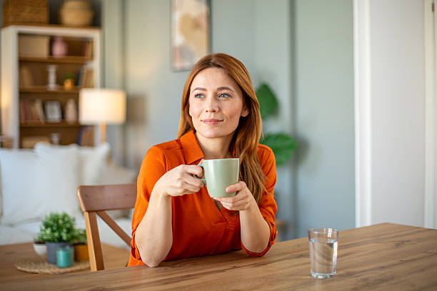 istock Woman enjoying coffee 2212773684